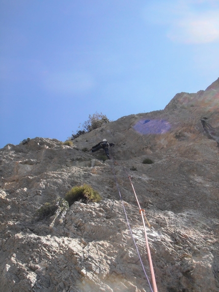 Oiscura... L'eco del Baratro, Punta Giradili, Sardinia - Adriano Cavallaro climbing the last pitch above the belay of Via Mediterraneo