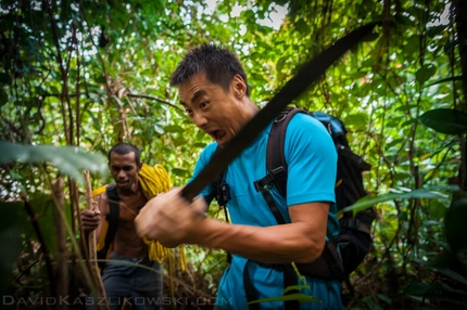 Damai Sentosa, Dragon's Horns, Malaysia - The team cut a new trail in the jungle.  Da Liu checks his cutting skills.