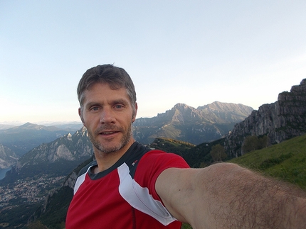 5 Walter Bonatti routes climbed in a day by Marco Anghileri - On the summit of Bastionata del Resegone. In the background the Medale face on the left and Grigna on the right, the next stages that day.