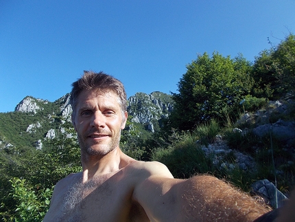 5 Walter Bonatti routes climbed in a day by Marco Anghileri - Cima del Medale, in the background the summit of Coltignone