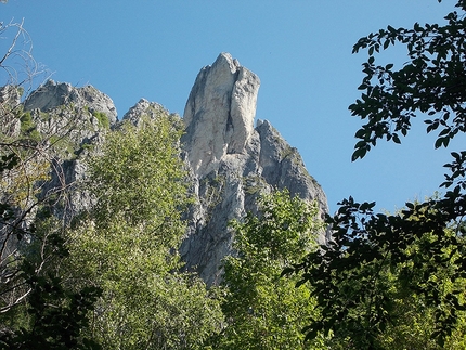 5 Walter Bonatti routes climbed in a day by Marco Anghileri - Torre Costanza; the Bonatti climb takes a line on the yellow wall to the left of the large Cassin crack.