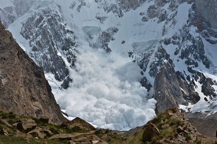 Kungyang Chhish East - Avalanche thundering down the Easr Face of Kungyang Chhish East, Karakorum, Pakistan.