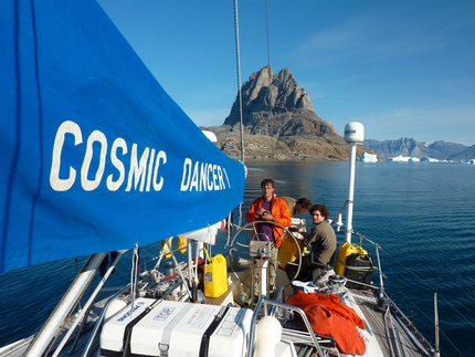 Greenland - The team sailing away from Uummannaq on the Cosmic Dancer.