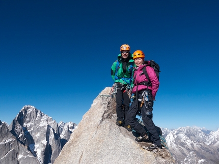 Mt Dayantianwo, Shuangqiao, China - Chaohui Zheng and Szu-ting Yi on the summit of Three Sheep Bring Prosperity (600m, 5.10 r/x, 60°, Dave Anderson, Chaohui Zheng, Szu-ting Yi) Mt Dayantianwo, Siguniang National Park, China.