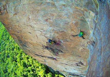 Akopan Tepui, Venezuela - Escalador Selvatico: Luca Giupponi starts up the difficult 4th pitch, 7b+.