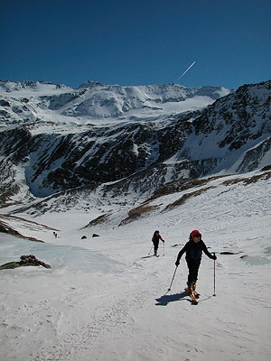 Cevedale: spring ski mountaineering - Ascending Cima Madriccio, Cima Marmotta in the background. Winter 2005 with very little snow.