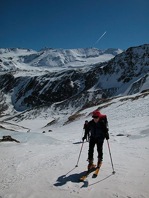 Cevedale: spring ski mountaineering - Ascending Cima Madriccio, Cima Marmotta in the background. Winter 2005 with very little snow.