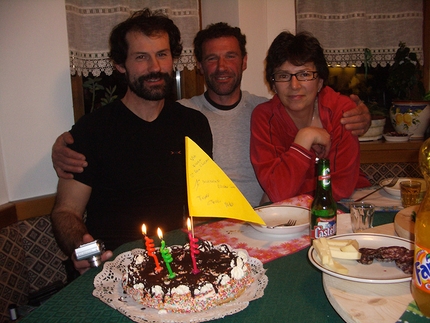 Ilio De Biasio - At Ilio's house after the first winter ascent of Via Flora, Seconda Pala di San Lucano: Cepo Conedera, Toni Zuech and Marinella