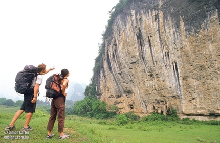 Yangshuo - Ryan Gormly and Olivia Hsu check out the impressive White Mountain cliff, near Yangshuo, China.