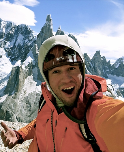 Tad Mccrea - Tad Mccrea, self portrait taken from near the summit of Aguja Rafael Juarez with the Torres in the background, Patagonia