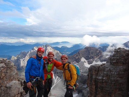 Brenta Dolomites, Brenta Base Camp 2014 - Alessandro Beber, Simone Banal and Alessandro Baù on the summit after the storm, happy but tired!