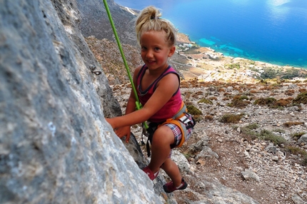 Kalymnos, Greece - A young girl climbing at Odyssey