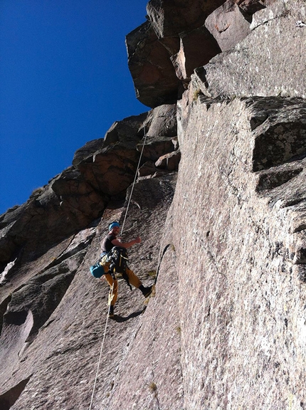 Pinne gialle - Tognazza, Dolomites - Matteo Mocellin on the static rope to photograph Manolo on Pinne Gialle