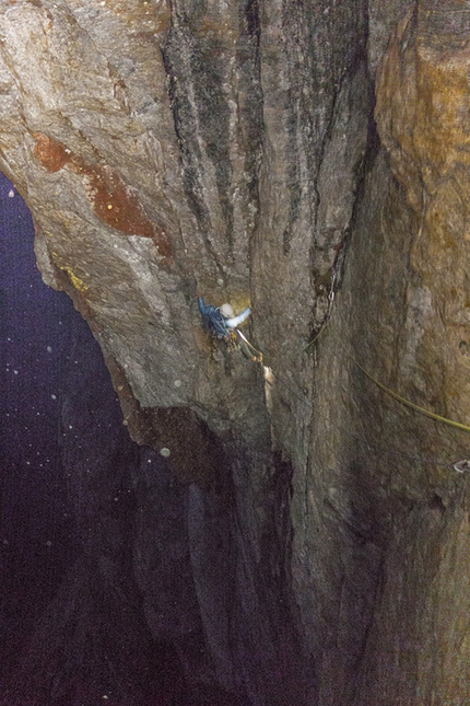 Greenland, Baffin Island - Olivier Favresse following Nicolas Favresse on pitch 23 of Shepton's Shove on the SE Pillar of Walker Citadel, Sam Ford Fjord - it's 1 am and a snow storm hit us again on our third attempt! Fortunately as we pushed through it, the sky cleared up and we could finally finish it! Yeah! This is our first climb in Sam Ford Fjord, Baffin Island;)