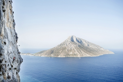 The North Face Kalymnos Climbing Festival 2014 - A climber taking part in the Climbing Marathon of the The North Face Kalymnos Climbing Festival 2014. The island of Telendos is clearly visible in the background.