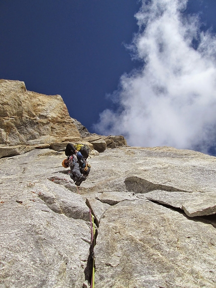 Miyar valley, Himachal Pradesh, India - Cyrill Bösch during the first ascent of Splitter and Storm (500m, TD 6a) climbed up the  Lotus Tower together with Elias Gmünder, Arunas Kamandulis and Gediminas Simutis