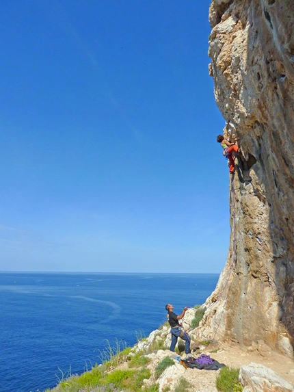 Climbing at Casarotto, Capo Caccia (Alghero, Sardinia) - Maurizio Oviglia and Cecilia Marchi climbing on a rebolted route at Casarotto, Capo Caccia (Alghero, Sardinia)