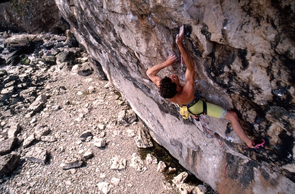 Jerry Moffatt - Jerry Moffatt making the first ascent of Liquid Ambar (F8c/+) at Lower Pen Trwyn, Wales in 1990. Liquid Ambar is dedicated to the memory of Jerry’s younger brother, Toby.