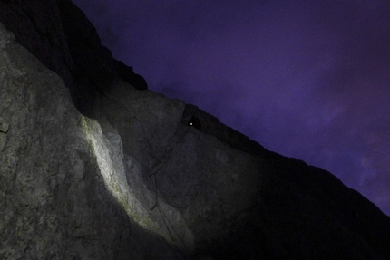 Triglav, Slovenia - Triglav North Face: Matevž Vukotic climbing the roof pitch during the winter ascent of the routes Prusik - Szalay and Obraz Sfinge, carried out from 23 - 26 December 2014 together with Matevž Mrak.