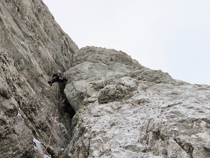 Travnik, Slovenia, Matevz Mrak, Matevz Vukotic e Nejc Marcic - Travnik North Face: Matevž Mrak, Matevž Vukotic and Nejc Marčič during the winter ascent of the route Sveca, carried out on 10/01/2015. Poorly protected chimney in Aschenbrenner route.