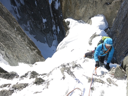 Tour Ronde, Mont Blanc - Chancer, NW Face Tour Ronde: Jon Bracey at the Col, before rapping into the Rébuffat.