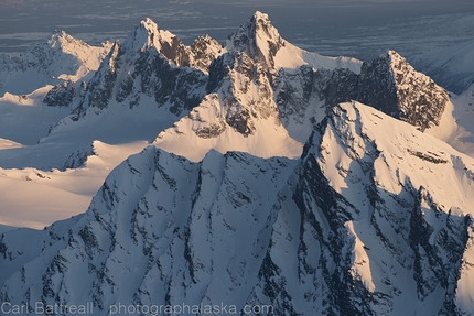 Alaska Range Project - The Ramparts.  A cluster of granite spires west of the lower Kahiltna Glacier. A secret backcountry ski playground for local guides and rangers, the Ramparts see very few visitors and the majority of the peaks remain unclimbed.