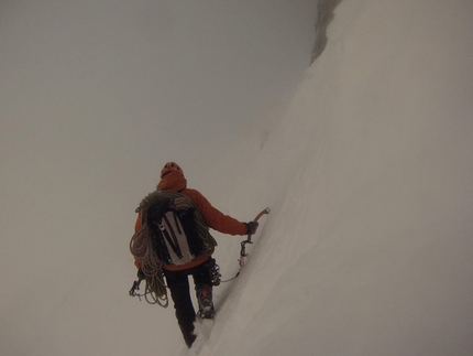 Tom Ballard, Petit Dru, Mont Blanc - Tom Ballard trying to avoid the crevasses in the murk on the way back to his tent after climbing the Allain - Leininger route up the North Face of the Petit Dru