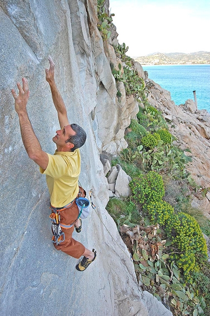 Cala Usai, Villasimius, Sardinia - Maurizio Oviglia balancing his way up Braille Trail (7c/7c+) at Villasimius, Sardinia