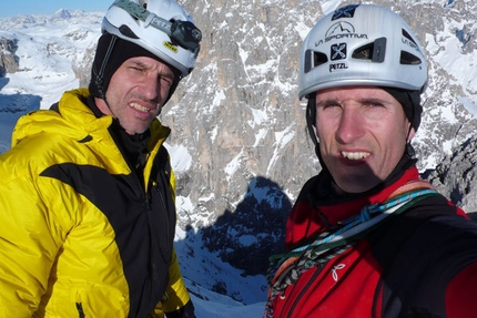 Masarda, Sass Maor, Dolomites - Fabio Leoni and Rolando Larcher on the summit, with the shadow of Sass Maor cast onto Cima Canali