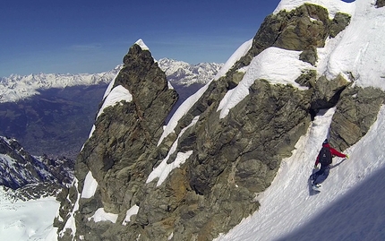 Monte Emilius, Valle d'Aosta, Davide Capozzi, Julien Herry - Davide Capozzi and Julien Herry snowboarding the NW Couloir of the North Face of Monte Emilius, Valle d'Aosta on 13/04/2015 .