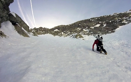 Monte Emilius, Valle d'Aosta, Davide Capozzi, Julien Herry - Davide Capozzi and Julien Herry snowboarding the NW Couloir of the North Face of Monte Emilius, Valle d'Aosta on 13/04/2015 .