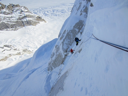 Mt Dickey, Alaska - Mt Dickey, Alaska: Chad Diesinger (blue jacket/upper climber) and John Frieh (red jacket/lower climber) following one of the early ice pitches on day one (March 20).