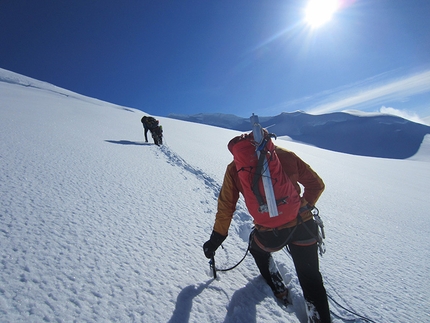 Mt Dickey, Alaska - Mt Dickey, Alaska: John Frieh (red backpack foreground) and Chad Diesinger (out front) trudging for the summit. As easy as it would have been to skip the summit and head straight for the descent the team completed the route to the summit of Mount Dickey.