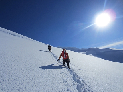 Mt Dickey, Alaska - Mt Dickey, Alaska: John Frieh (red backpack foreground) and Chad Diesinger (out front) trudging for the summit. As easy as it would have been to skip the summit and head straight for the descent the team completed the route to the summit of Mount Dickey.