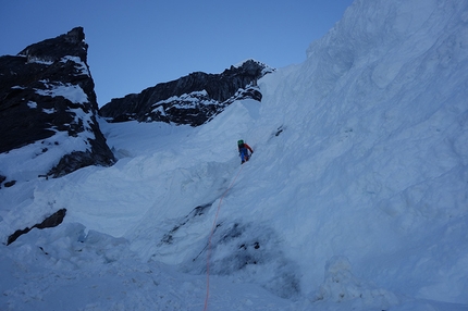 Lucifer North Face, Alaska, John Frieh, Doug Shepherd - Lucifer North Face, Alaska: Doug Shepherd finding a way through one of the many crevasses we encountered. Given the warm temps and low snow pack the face was, in short, a mess and required some creative route finding and good old fashioned blue collar alpinism: post holing and avoiding crevasses.