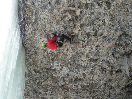 Tom Ballard - Tom Ballard climbing House of Flying Daggers M13, Bingo Cave, Hyalite Canyon.