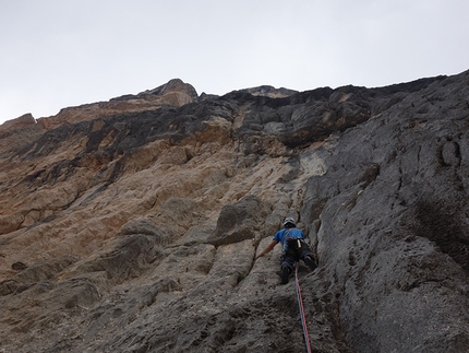 Punta del Pin, Dolomiti di Braies, Ulrich Viertler, Raffaele Sebastiani - Raffaele Sebastiani climbing the compact slabs at the start