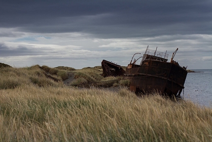 Patagonia climbing - Remains of a boat at Puerto Natales, Patagonia