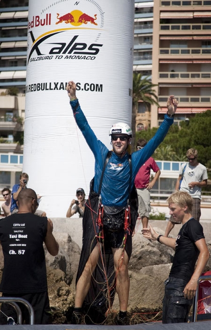 RED BULL X-ALPS 2009 - Christian Maurer celebrating at Lavotto beach in Monaco after winning the 2009 edition of Red Bull X-Alps.