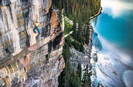 Alexander Megos flashes The Path at Lake Louise in Canada
