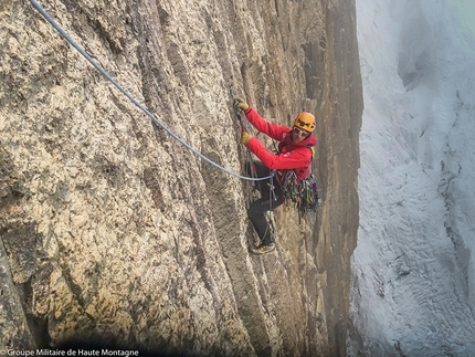 Puscanturpa Este, Peru, Arnaud Bayol, Antoine Bletton, Cyril Duchene, Dim Munoz - During the first ascent of 'El Juego Sumando', north face of Puscanturpa Este, Peru:  Arnaud Bayol aid climbing through poor weather