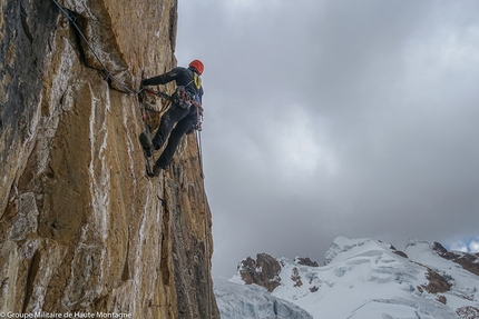 Puscanturpa Este, Peru, Arnaud Bayol, Antoine Bletton, Cyril Duchene, Dim Munoz - During the first ascent of 'El Juego Sumando', north face of Puscanturpa Este, Peru: Dimitry Munoz aid climbing up pitch 3