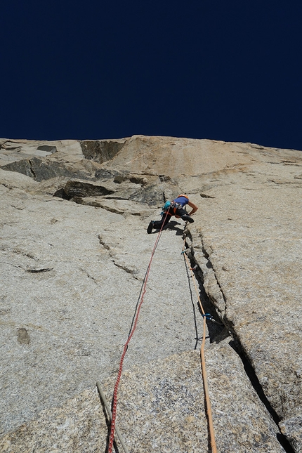 Divine Providence, Mont Blanc, Nina Caprez, Merlin Benoit - Nina Caprez climbing a 7a pitch on Divine Providence, Mont Blanc