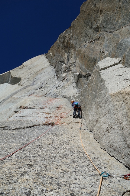 Divine Providence, Mont Blanc, Nina Caprez, Merlin Benoit -  Nina Caprez climbing a 7a+ pitch on Divine Providence, Mont Blanc