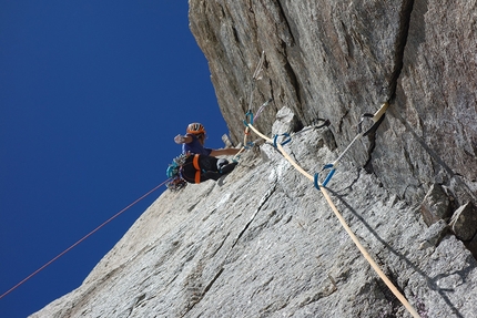 Divine Providence, Mont Blanc, Nina Caprez, Merlin Benoit -  Nina Caprez climbing a 7b pitch on Divine Providence, Mont Blanc