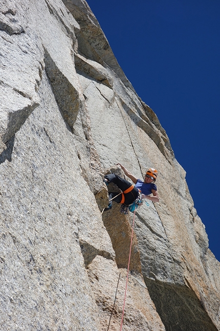 Divine Providence, Mont Blanc, Nina Caprez, Merlin Benoit - Nina Caprez climbing a 6c pitch on Divine Providence, Mont Blanc