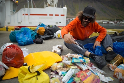 Mythic Circle, Greenland, climbing - Paolo Marazzi preparing gear to go climbing in the Mythic Circle, Greenland