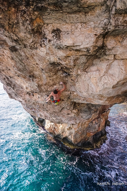 Jernej Kruder, Es pontas, Mallorca - Jernej Kruder making the first repeat of the Deep water solo climb Pontax 8c,  Es pontas, Mallorca