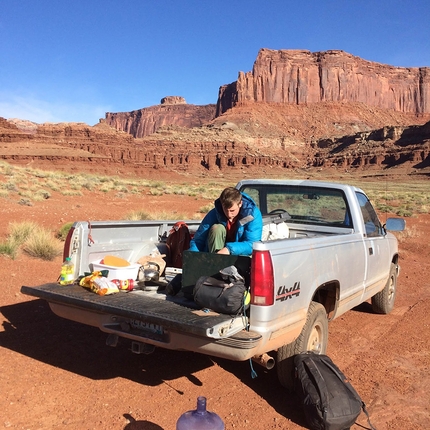 The Millennium Arch, Canyonlands, USA, Tom Randall, Pete Whittaker - Pete Whittaker searching for the perfect offwidth crack at Canyonlands, USA