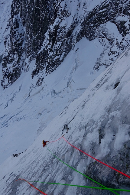 Pizzo Badile, Amore di Vetro, Marcel Schenk, Simon Gietl - Simon Gietl following the first difficult pitch during the first ascent of 'Amore di Vetro', Pizzo Badile on 16/11/2016 